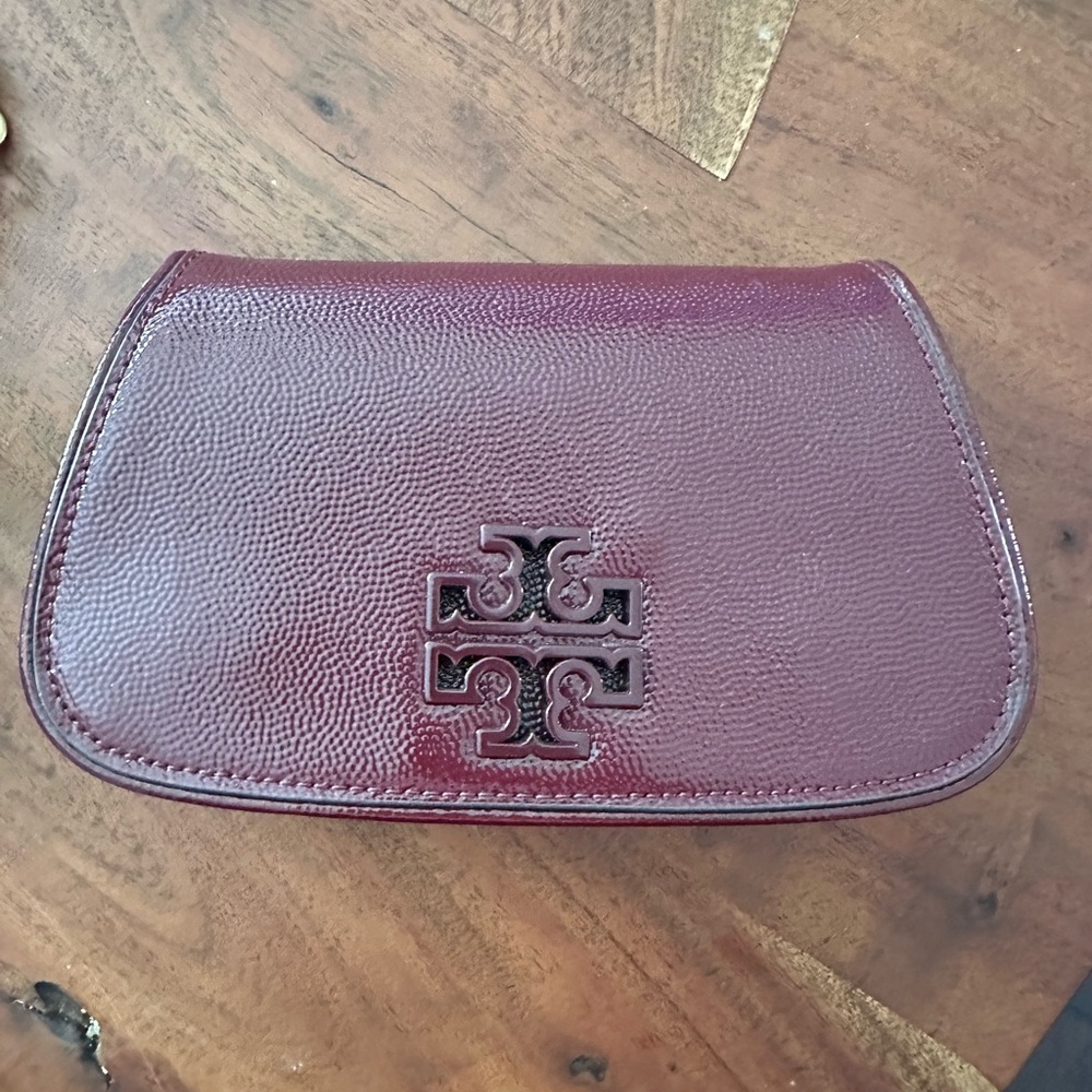 Tory Burch Burgundy Leather Clutch with Flap Closure